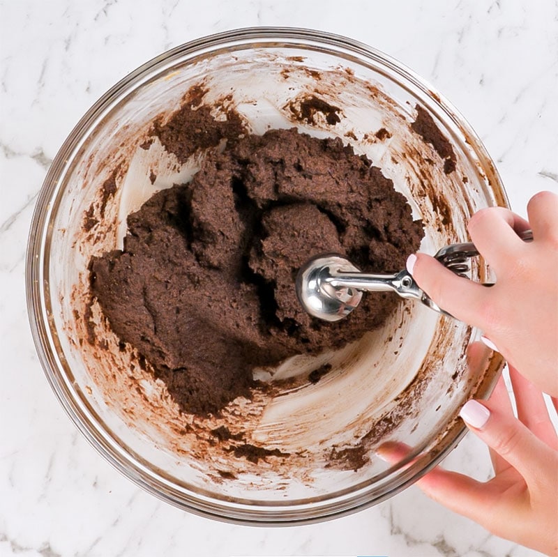 Keto Chocolate Cookies Ingredients mixed in a glass bowl.
