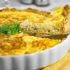 Keto quiche Lorraine a white pie dish.