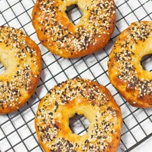 keto bagels on a baking rack.