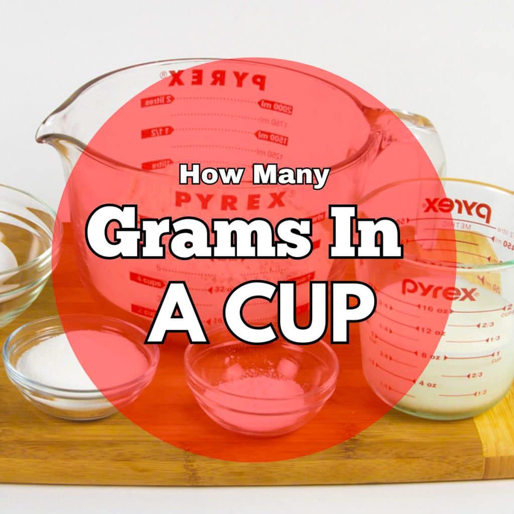 How many grams in a cup with measuring cups in the background.